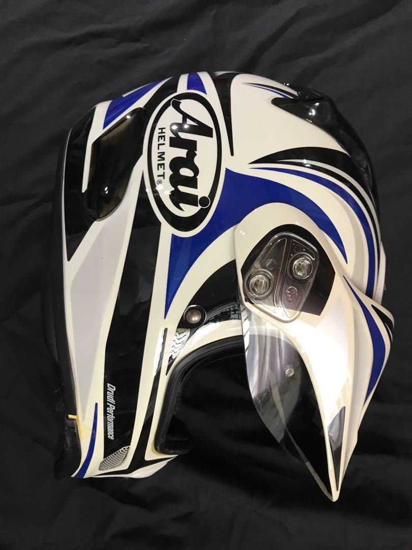 Arai helmet (preowned) tour cross 2 (Category: Motorcycle Apparel) located in Singapore. Submitted by jaafaar (Listing ID 210949765, Image 1). Description: Not for fussy buyers Original Arai helmet is preown. Used by me afew time. With light scratches. What you see is the condition its in now. Condition 6/10 Need to change Rubber seal. Need to change chin strap cover, worn. Come without visor peak, but converted to side cap. 55-56cm,S size.