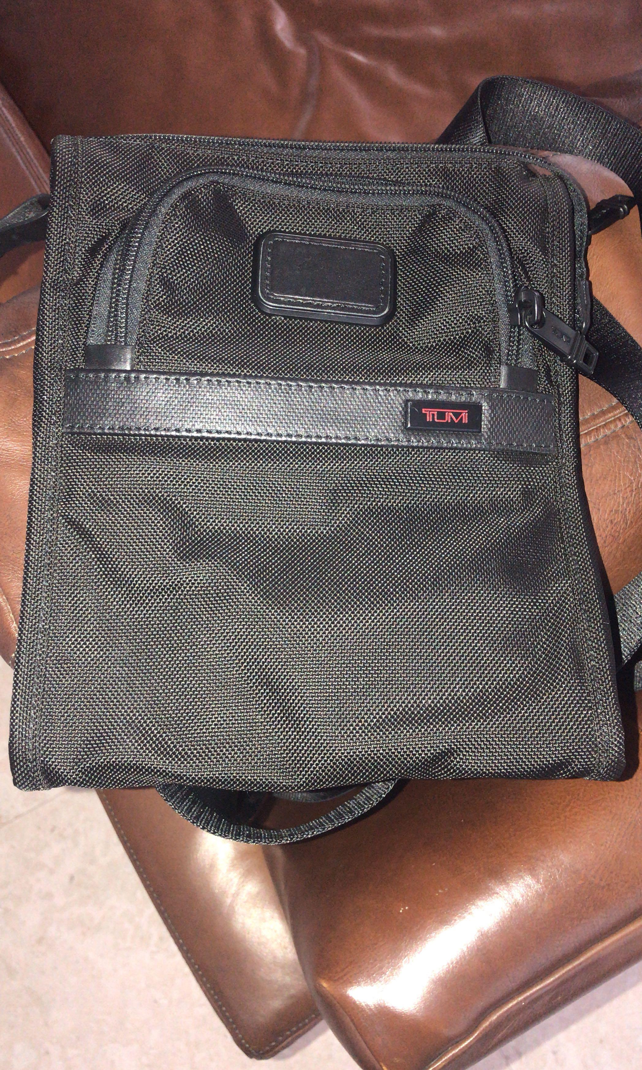 tumi small sling bag