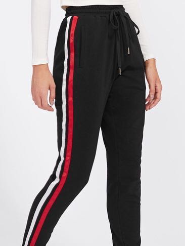 women's black track pants with white stripe