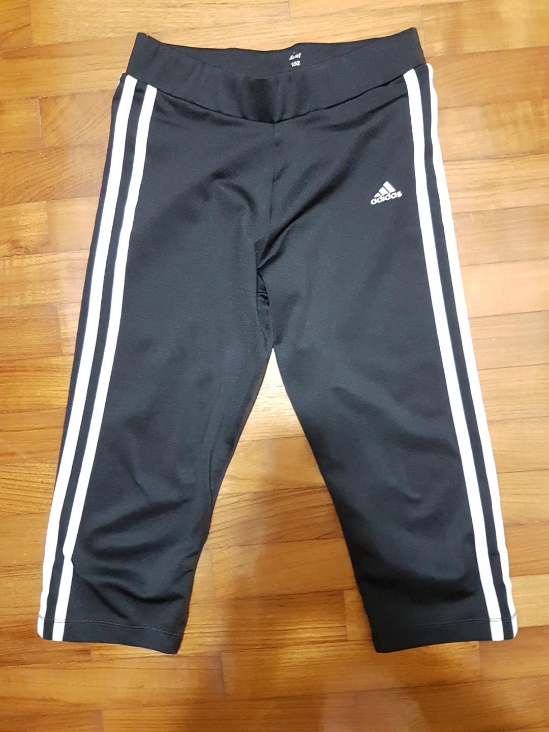 Girl in online adidas pants
