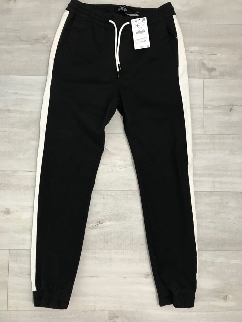 black jogging pants with white stripe