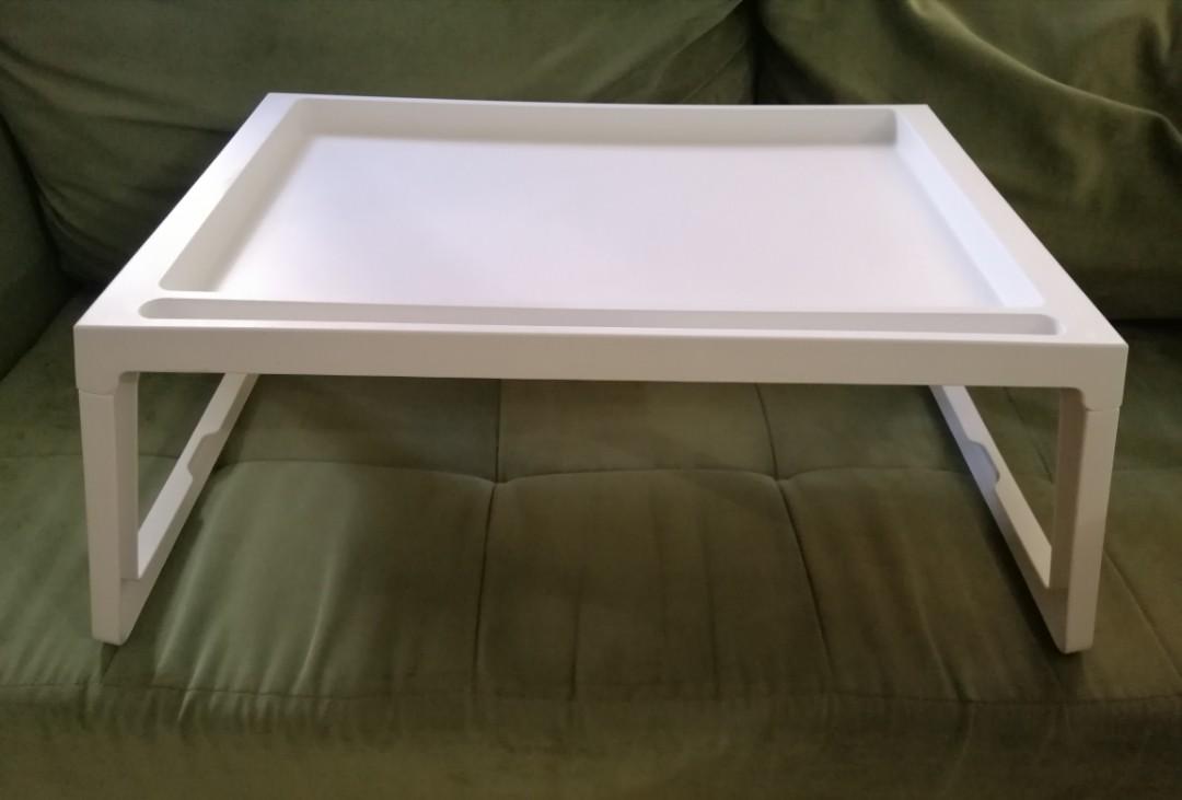 REPRICED IKEA Bed Table Sofa Table (Category: Tables & Sets) located in Makati City. Submitted by joybee6 (Listing ID 220094118, Image 1). Description: I'm selling depicted IKEA Bed/Sofa Table. It has only been used 2 times and is in pristine condition. This is perfect for a cosy breakfast in bed, having a meal infront of the TV or utilizing it as a study desk. Meet up at SM Jazz Makati or BGC area. Please PM me if interested. Slightly negotiable