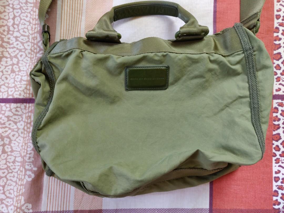 Marc by Marc Jacobs Messenger bag (Category: Sling Bags) located in Cavite. Submitted by luckygingerivy (Listing ID 220085391, Image 3). Description: READ! Last Price Posted If its posted, its still AVAILABLE Authentic Marc Jacobs Messenger Military Resort bag. Unisex. 9/10 condition. Bought locally for P8,000. No holes, tears, loose stitchings and fading. Perfect for office, school or casual use. Details: Marc by Marc Jacobs Designer Brand “Stan