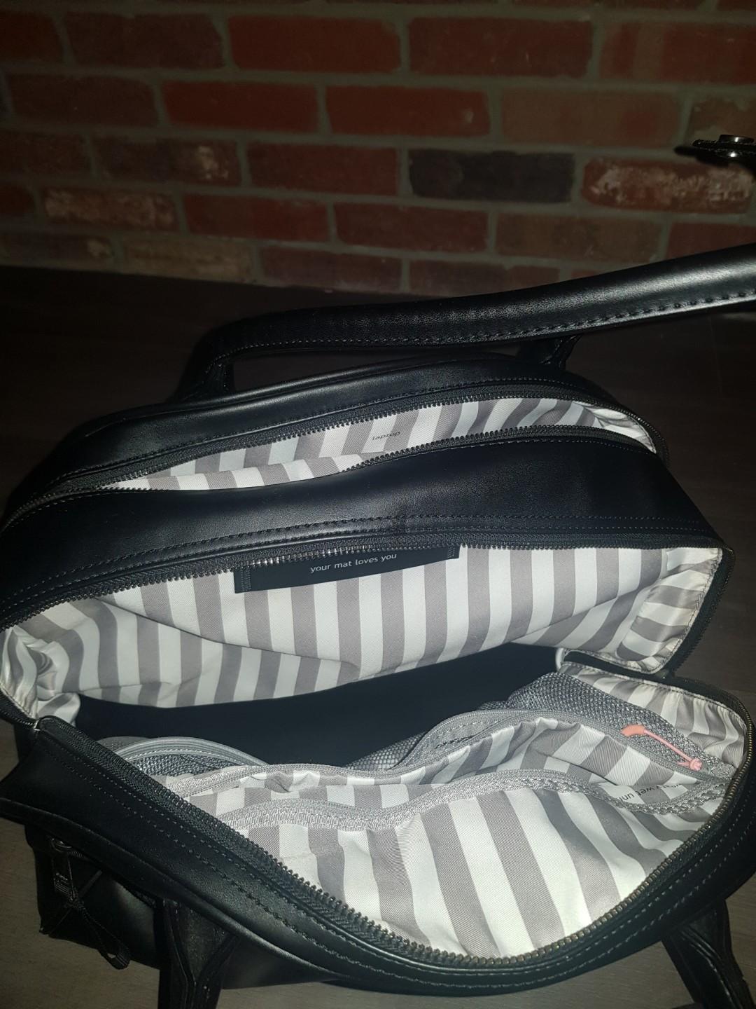 Lululemon bag (Category: Bags & Wallets) located in Toronto. Submitted by isabel321 (Listing ID 220357288, Image 3). Description: Black Yoga mat holder Laptop compartment Small pocket on the back Spacious Lots of pockets.