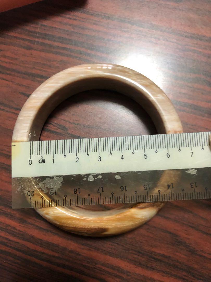 Bangle (Category: Necklaces) located in Singapore. Submitted by teetee21 (Listing ID 220759800, Image 3). Description: Bought from Myanmar not sure what kind of jade. Brand new unworn. Comes with box only. Suits fleshy wrists as it’s size 64mm dia. .