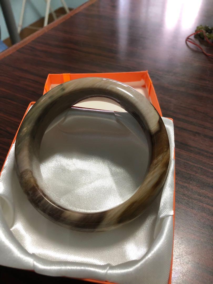 Bangle (Category: Necklaces) located in Singapore. Submitted by teetee21 (Listing ID 220759800, Image 4). Description: Bought from Myanmar not sure what kind of jade. Brand new unworn. Comes with box only. Suits fleshy wrists as it’s size 64mm dia. .