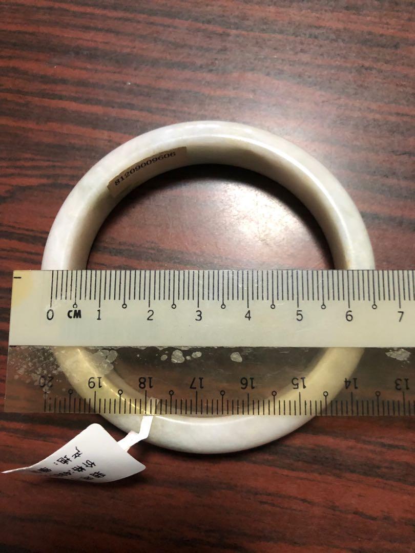 Jade bangle (Category: Necklaces) located in Singapore. Submitted by teetee21 (Listing ID 220758643, Image 3). Description: Excellent piece of jade bangle A grade with certificate and box. Brand new with tag. .