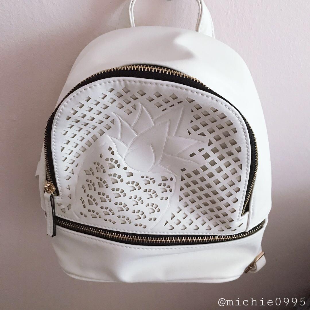 White Mini Backpack (Category: Backpacks) located in Kota Kinabalu. Submitted by michie0995 (Listing ID 219625902, Image 1). Description: White mini backpack - Adjustable straps - Inner pockets Condition: 10/10 // Only mailing & delivery // Can ask for more pics :).