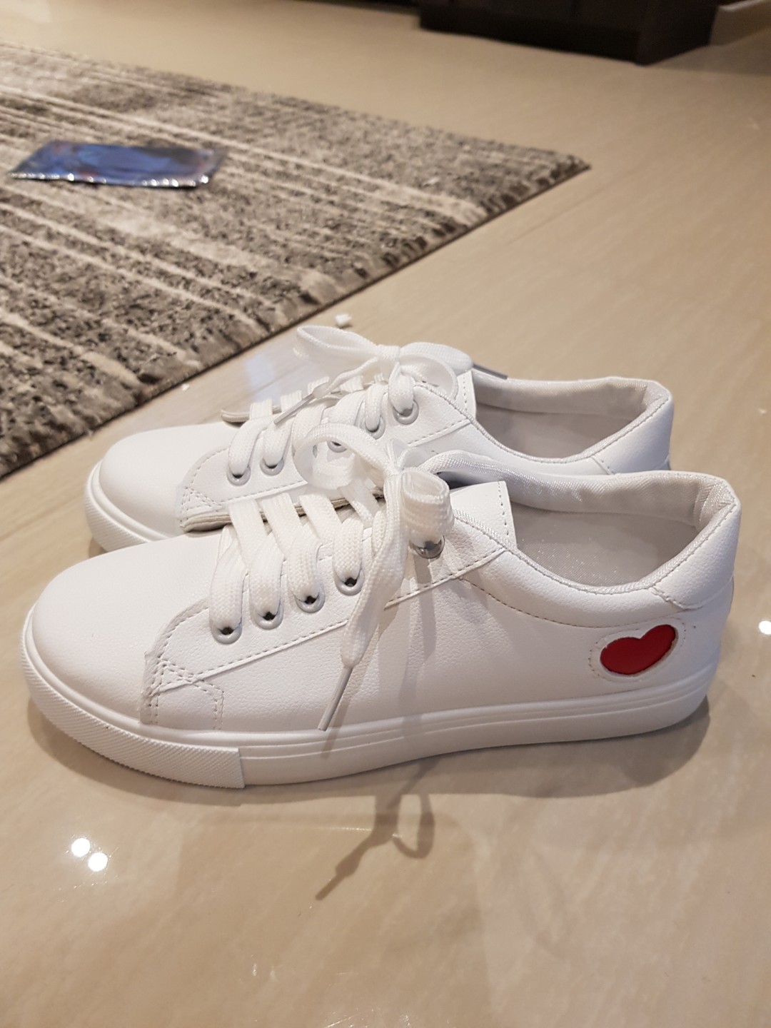 White sneakers with outlet red heart