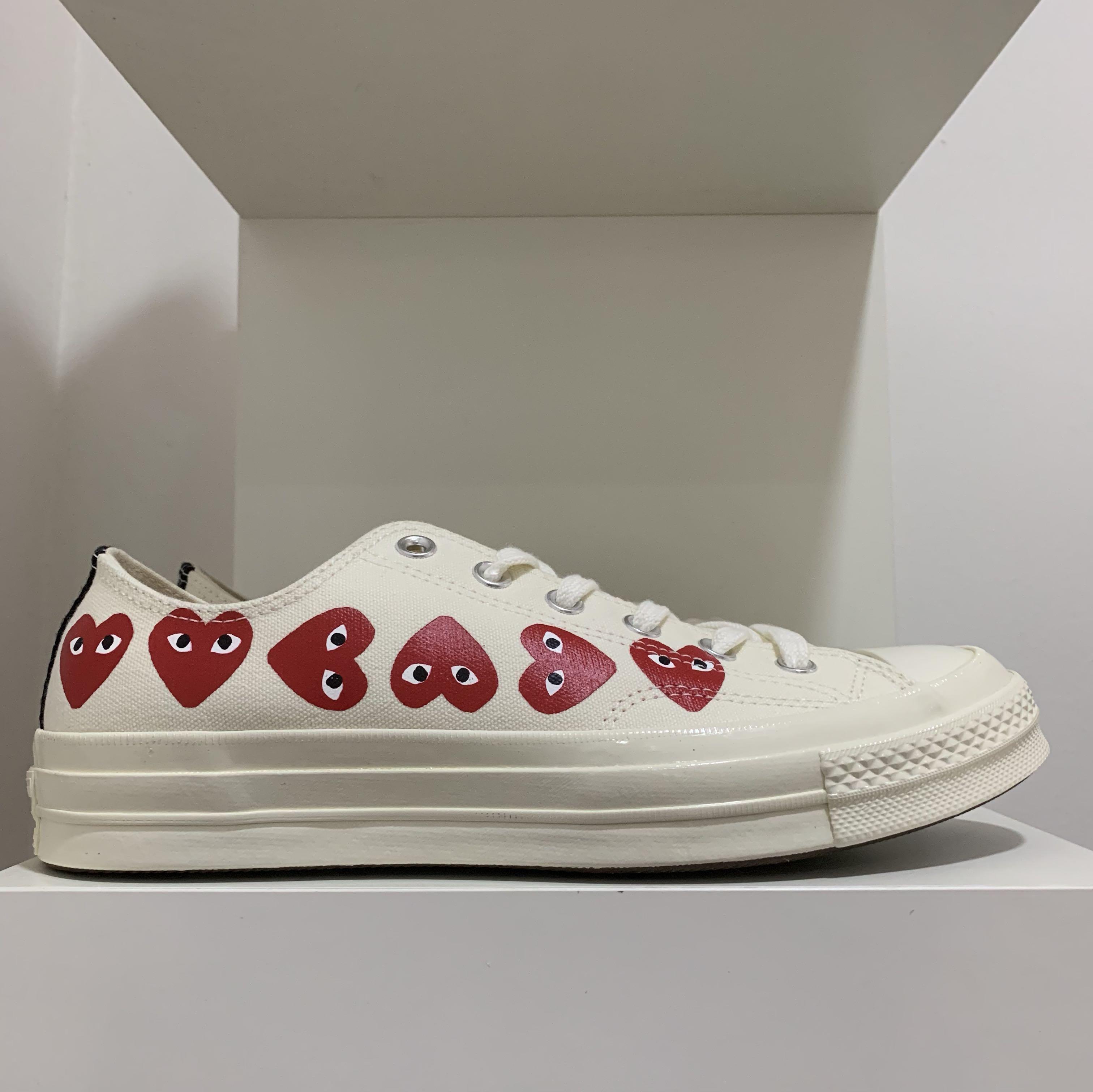 comme des garcons converse with multiple hearts