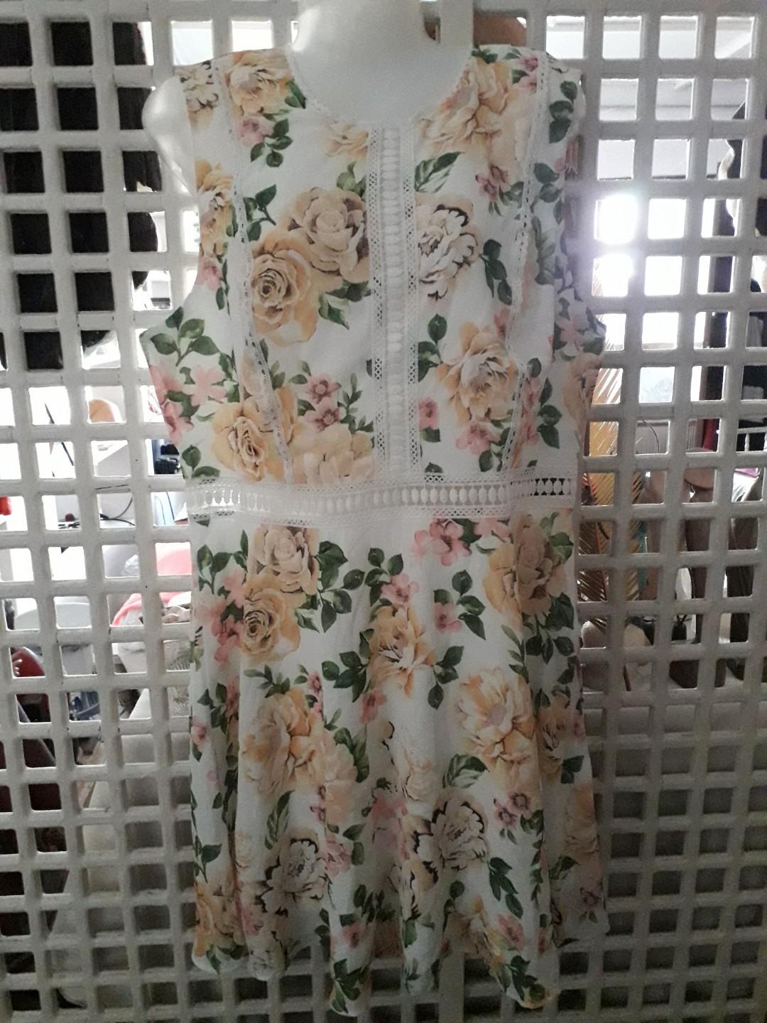 Floral S/L Dress (Category: Dresses) located in Paranaque City. Submitted by 1tsmerach (Listing ID 221056327, Image 1). Description: New with tag Floral Sleeveless dress With crochet details Armpit to armpit 20" Length 37" #wfsale BPI/BDO deposit.