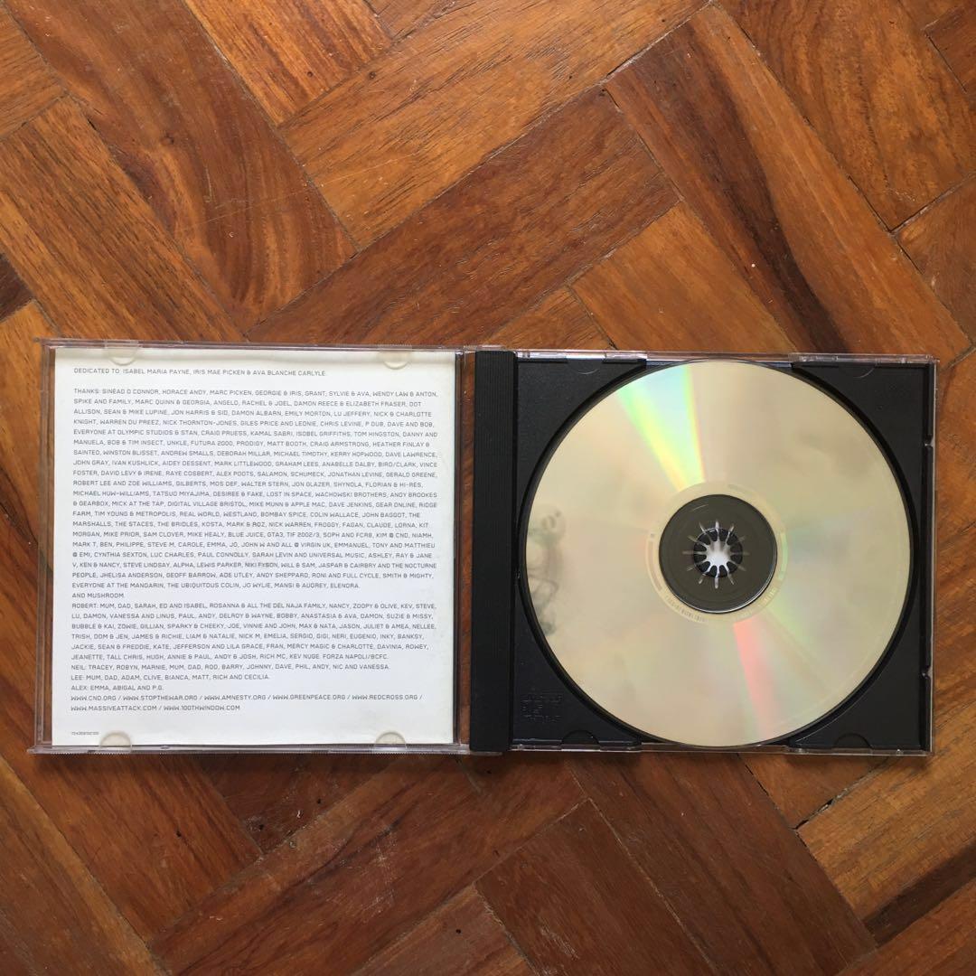 Massive Attack - 100th Window (Category: CDs & DVDs) located in Mandaluyong City. Submitted by aeonartph (Listing ID 214291981, Image 2). Description: Artist: Massive Attack Album: 100th Window Genre: Trip-Hop Disc: NM Inlay: NM ————— Mint (M) Perfect. No scuffs/scratches, unplayed - possibly still sealed. Insert/Inlay/Booklet/Sleeve/Digipak: Perfect. No wear, marks, or any other imperfections - possibly still sealed. Near Mint (NM) Near perfect.
