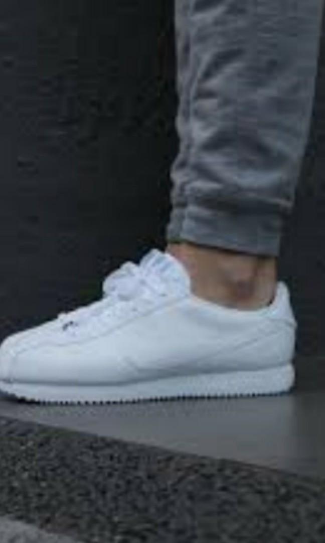 Nike triple white cortez store