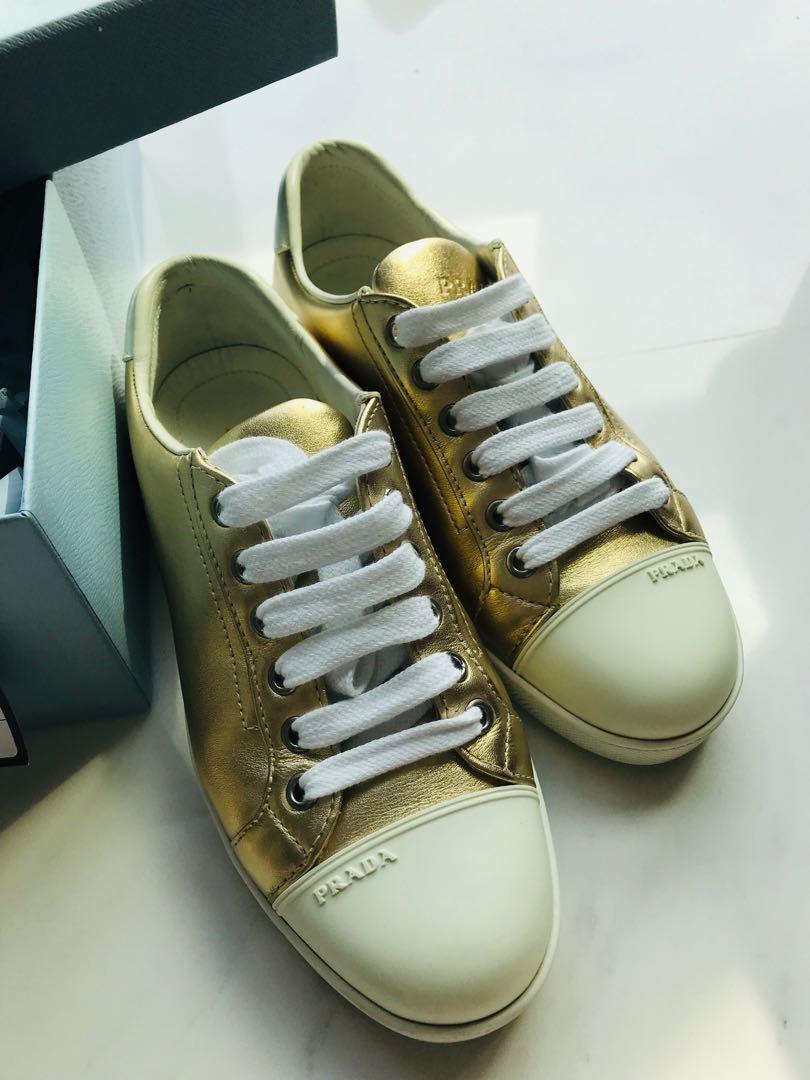 prada gold sneakers