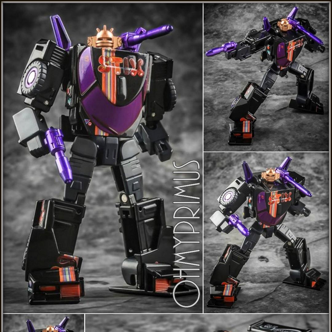 Toyworld TWGS02B TWGS02B Whisky Jack Black Transformers Legends