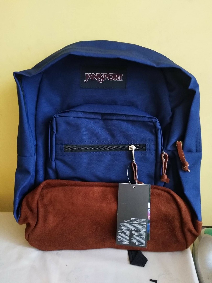 Blue jansport 2025 backpack with leather