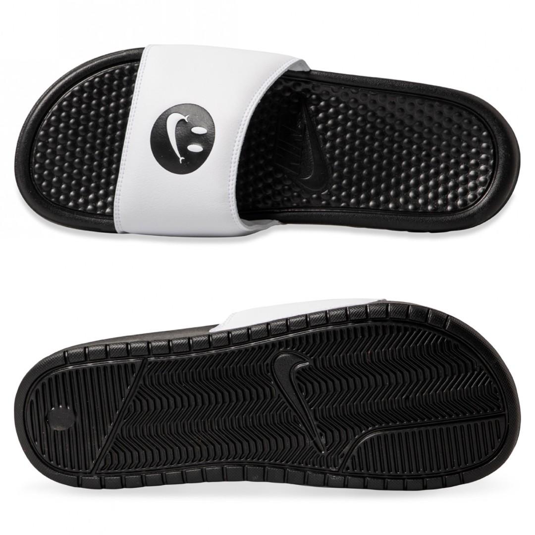 nike slides with smiley face