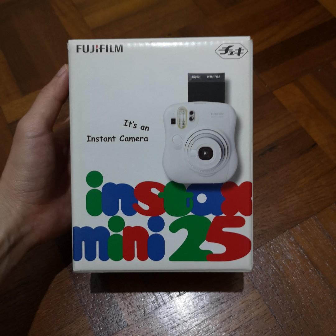 Non-functioning Instax Mini 25 (Category: Cameras) located in Singapore. Submitted by cinnamontree (Listing ID 221583210, Image 3). Description: Non-functioning. in other words, spoilt. only for someone who is able to repair it themselves or find someone else to repair it. problem: I turn it on and the lcd screen is showing '10' and just stuck at that. clicking the shutter buttons doesn't do anything. no flash and no signs of the gears turning to