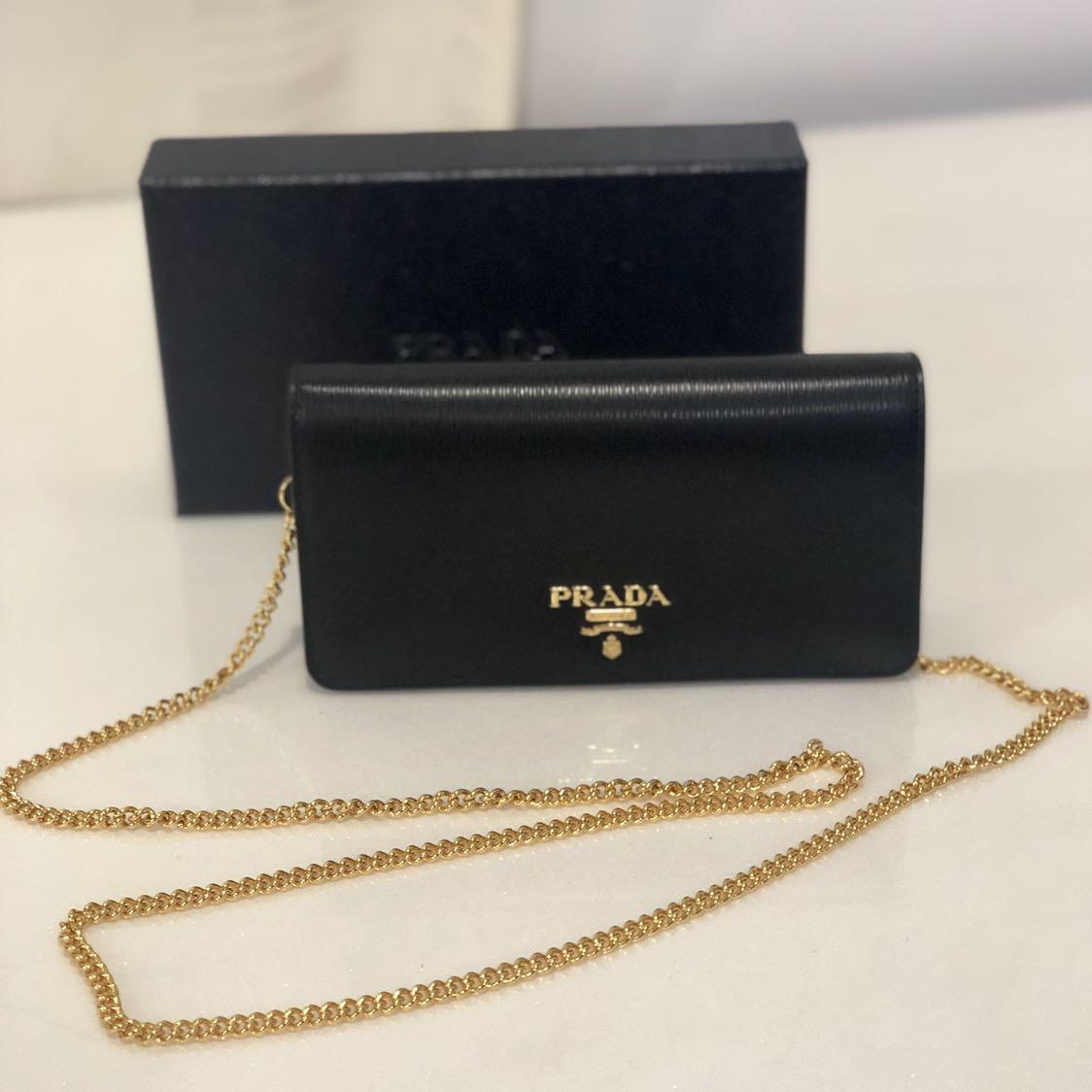 Prada wallet on chain saffiano leather, Women's Fashion, Bags & Wallets,  Purses & Pouches on Carousell