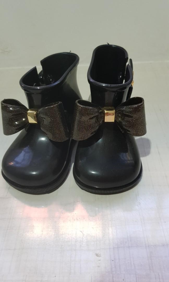 mini melissa black boots