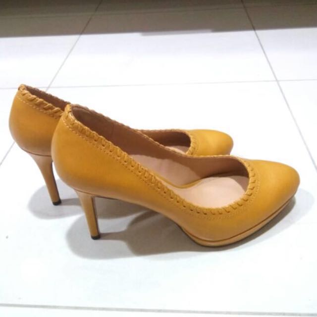 mustard high heel shoes