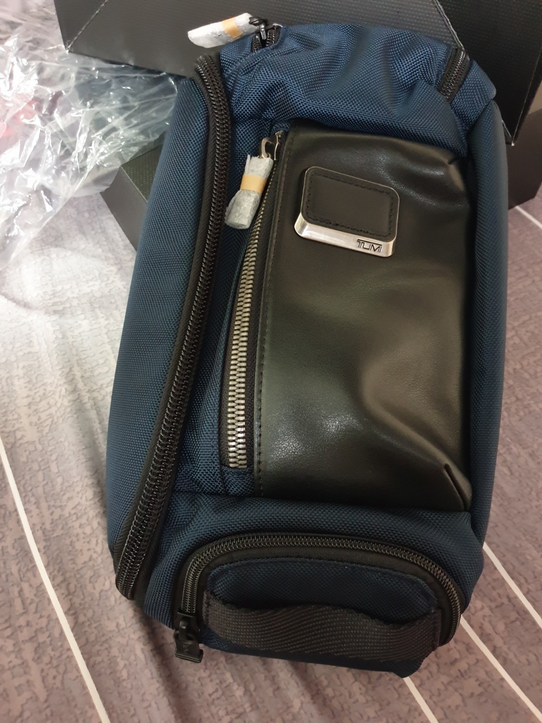Tumi kelley sling price deals