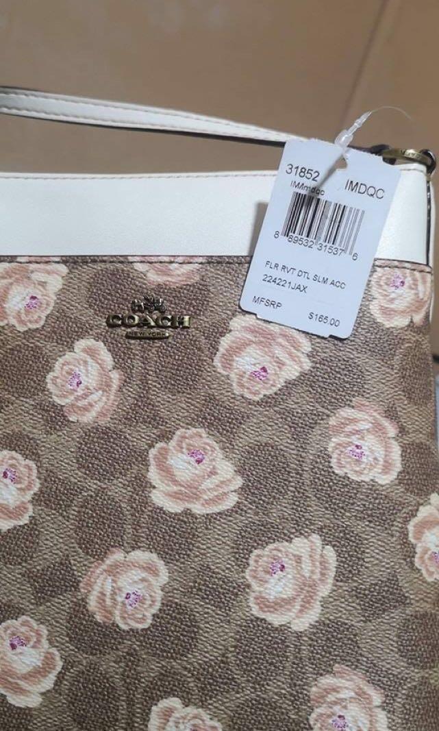 Kitt messenger crossbody sales in signature rose print
