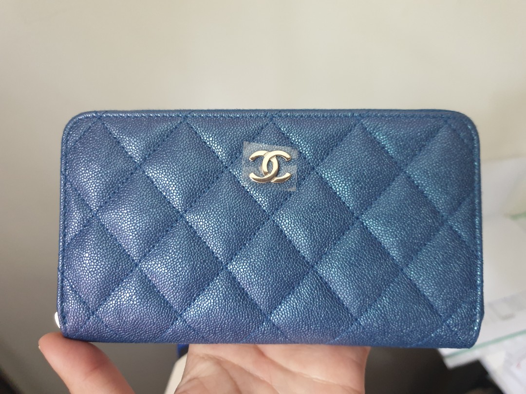 19S Chanel medium zippy wallet in irridescent blue caviar, Luxury, Bags &  Wallets on Carousell