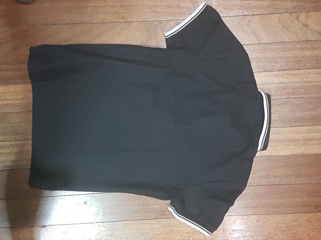 Black Giordano Polo shirt (Category: Tshirts & Polo Shirts ) located in Makati City. Submitted by rjp20 (Listing ID 222345771, Image 3). Description: Good condition. Black Polo shirt. Giordano.