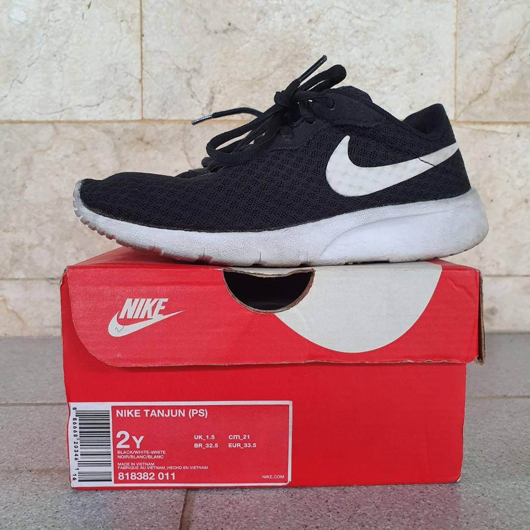 nike tanjun size 4