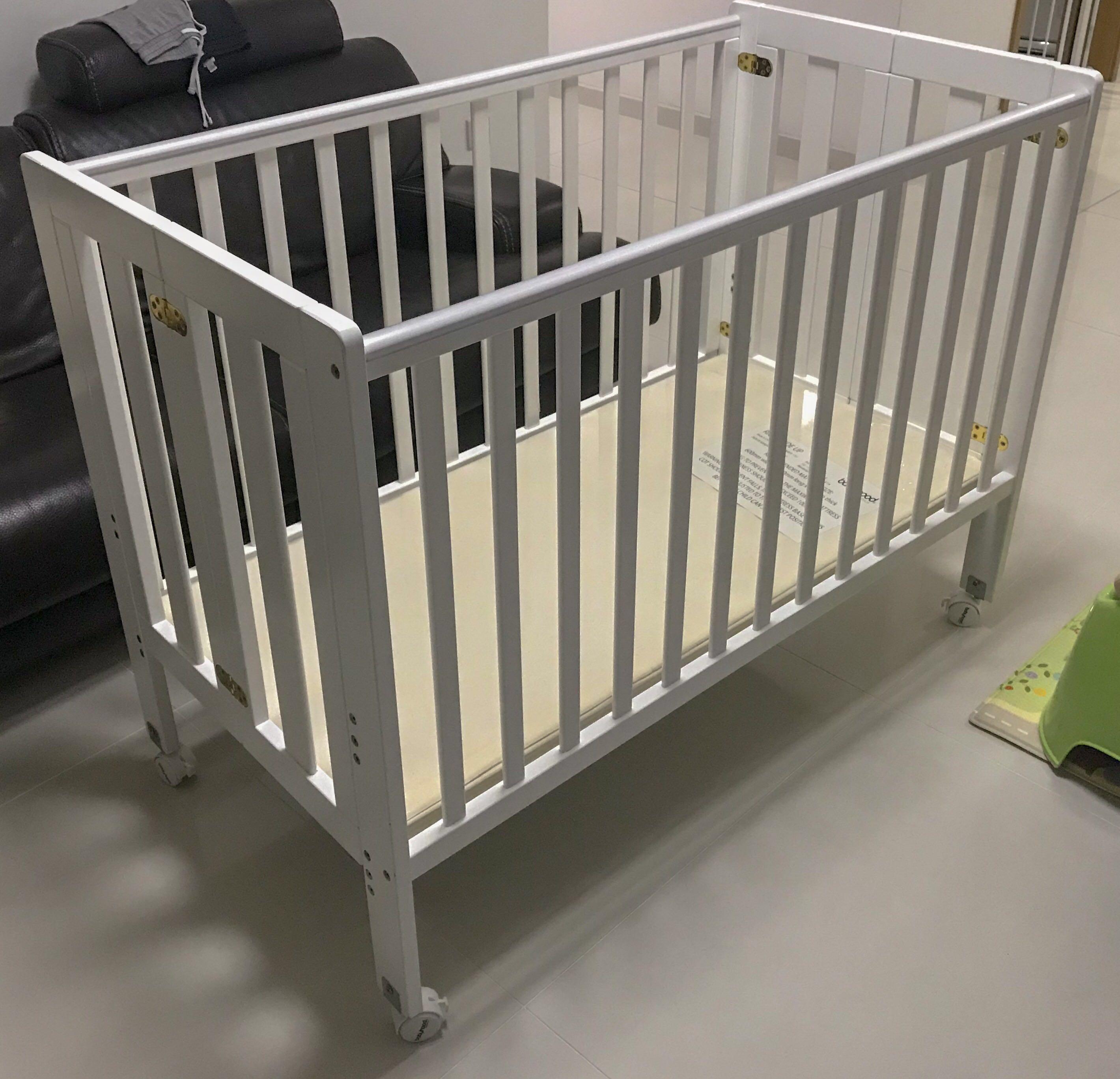 Babyhood fold n sales go cot