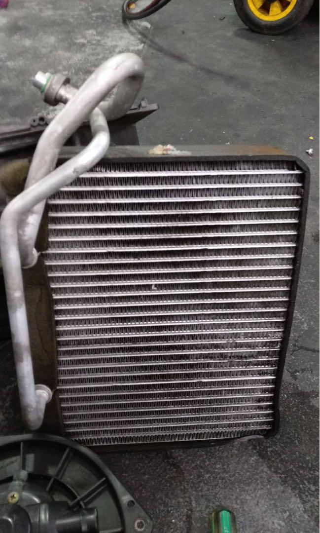 Car air con service Nissan Urvan E25 mini bus general service front