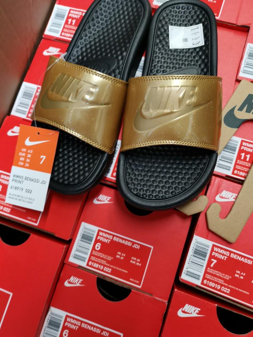 womens rose gold nike slides