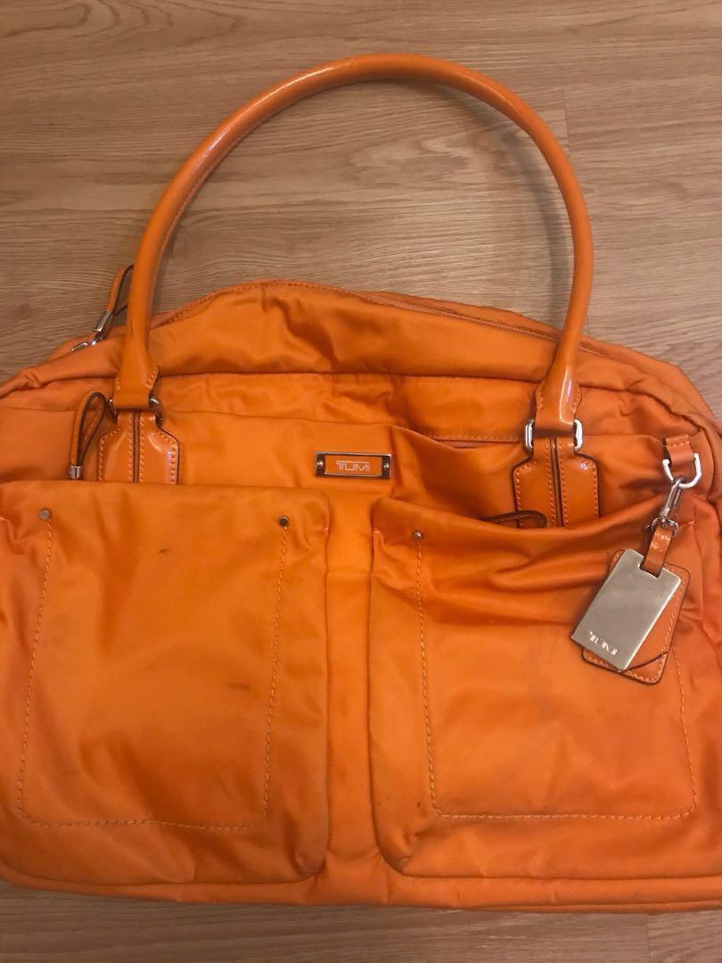 Tumi orange bag clearance
