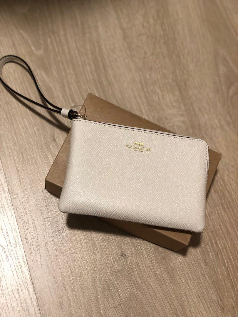 coach wristlet white