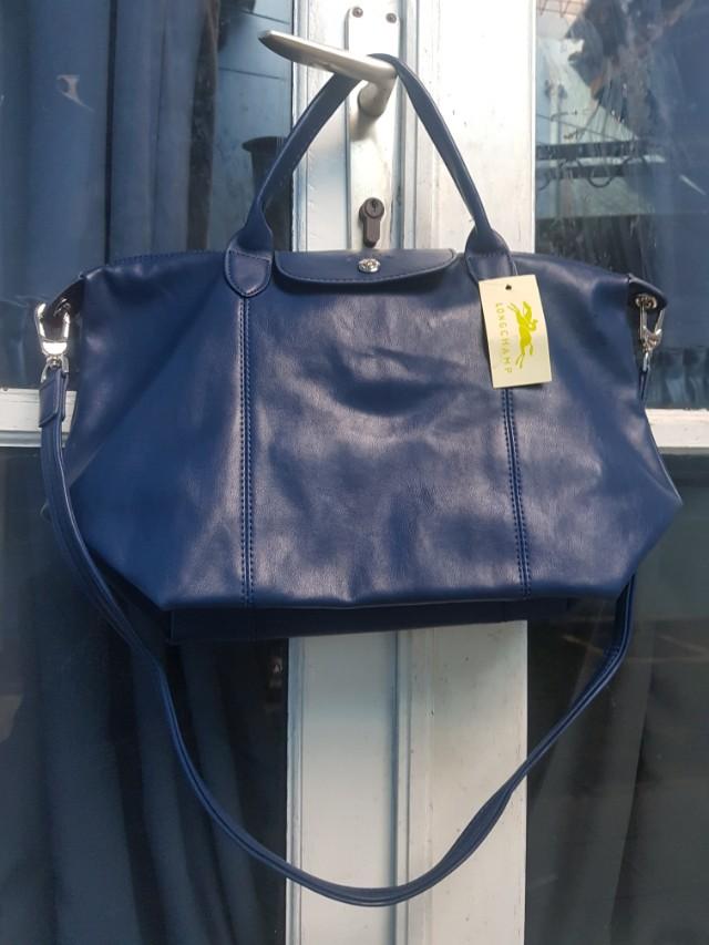 tas longchamp kulit