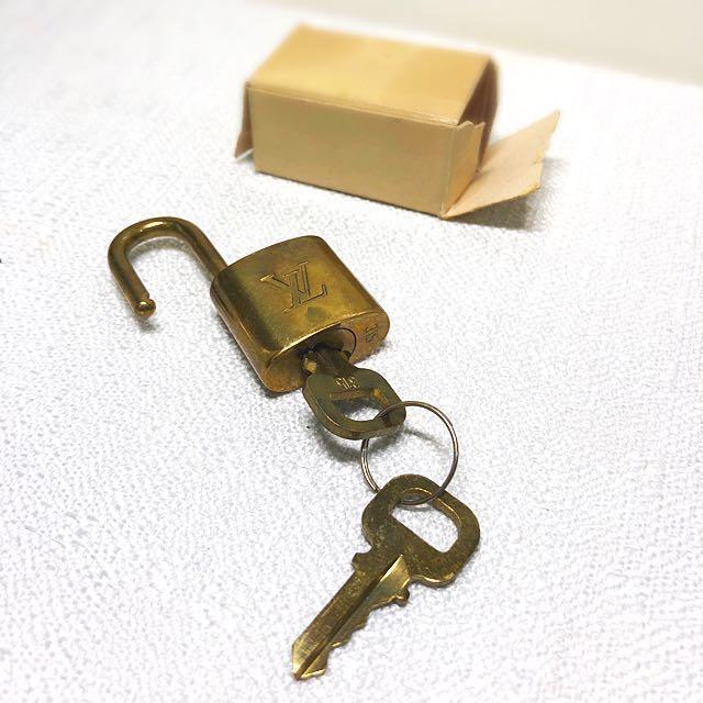 Authentic Louis Vuitton Lock and Keys, Luxury, Accessories on Carousell