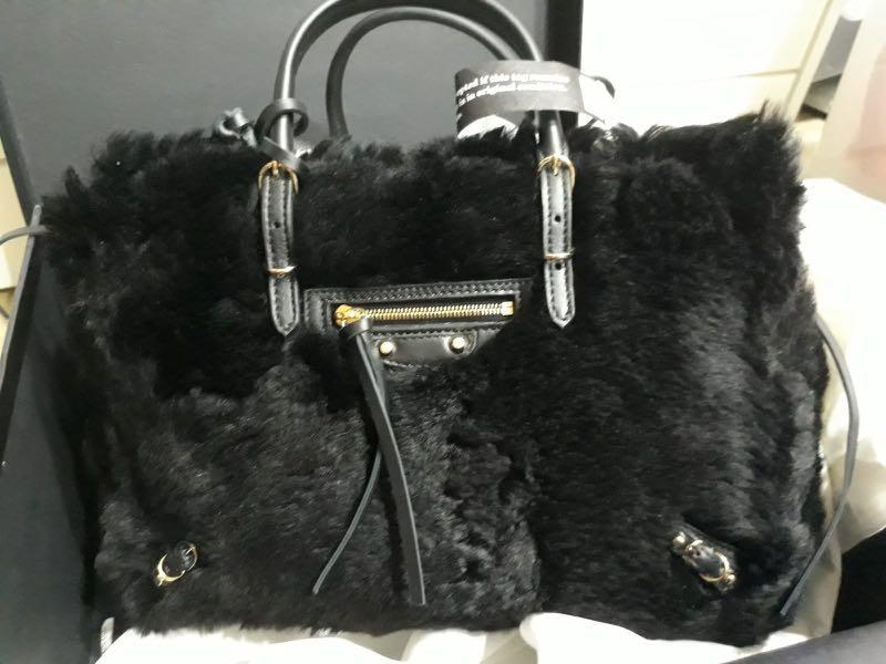 balenciaga fur bag
