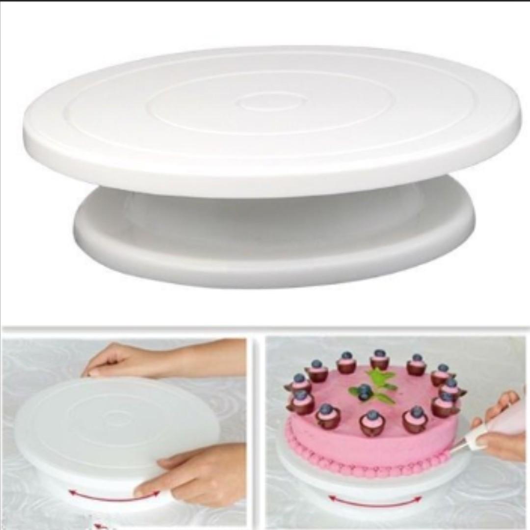Cake Decorating Turntable (Category: Bakeware) located in Manila. Submitted by trustradeglobal (Listing ID 222766752, Image 2). Description: Decorate your cake easily by rotating it on this turntable. It is made with durable polypropylene material, and comes with a non-slip base, for a stable rotation while decorating cakes, pastries, cupcakes, cookies, etc. -Material: PP - Diameter: 28cm - with anti-slip bottom - used for decorating cakes, pastr