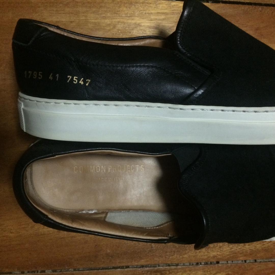 COMMON PROJECTS Leather/Canvas Slip-on (Category: Sneakers) located in Cebu City. Submitted by denimholic (Listing ID 222824407, Image 2). Description: Authentic Common Project slip-on Size: 8.5 US / EU 42 Material: Leather w/ canvas Made in Italy Condition: 8.5/10 minimal heel drag Message for more pics & details. Thanks.