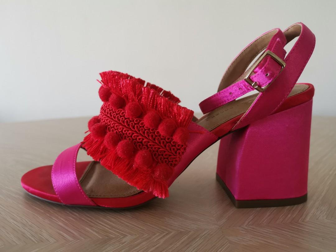 red embroidered heels