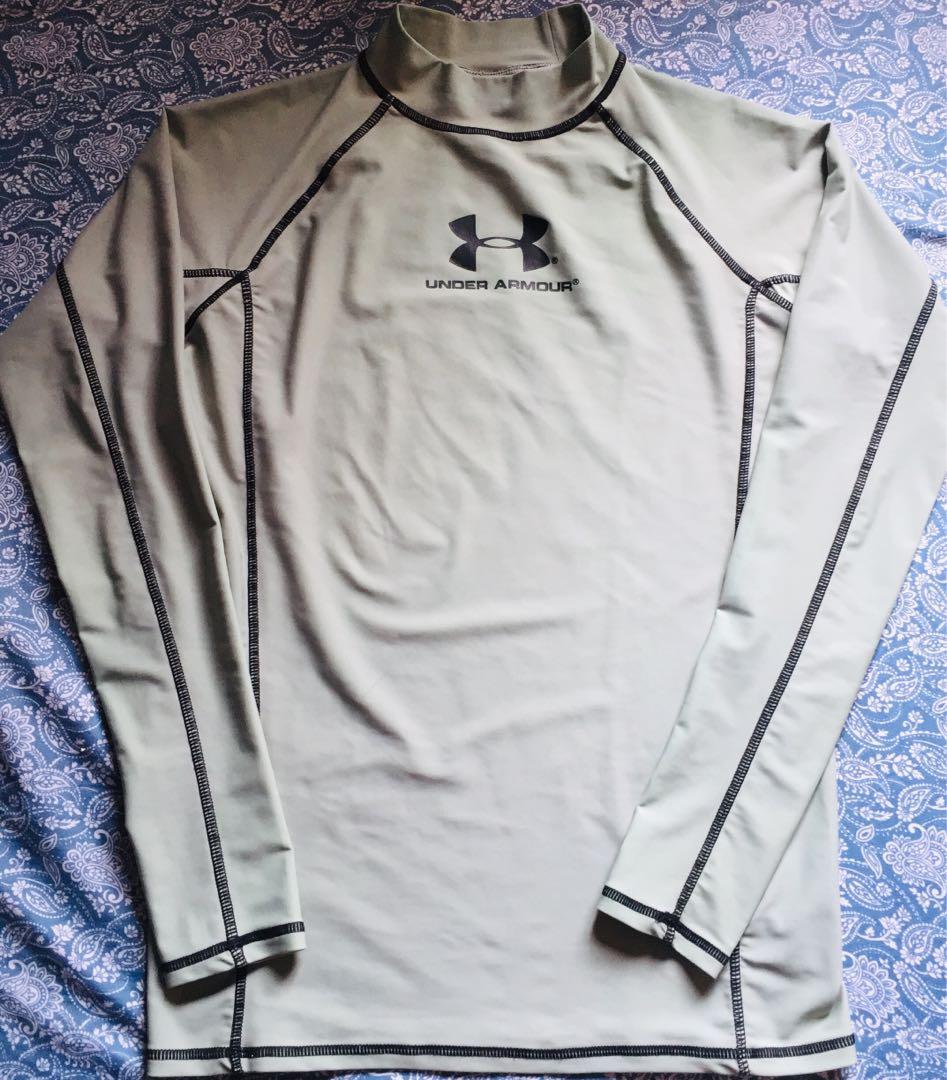 Under Armour Rash guard (Category: Activewear) located in Quezon City. Submitted by chinitoman (Listing ID 223056201, Image 1). Description: Selling this Medium Gray Under Armour Rash Guard Used only twice PM is the key.