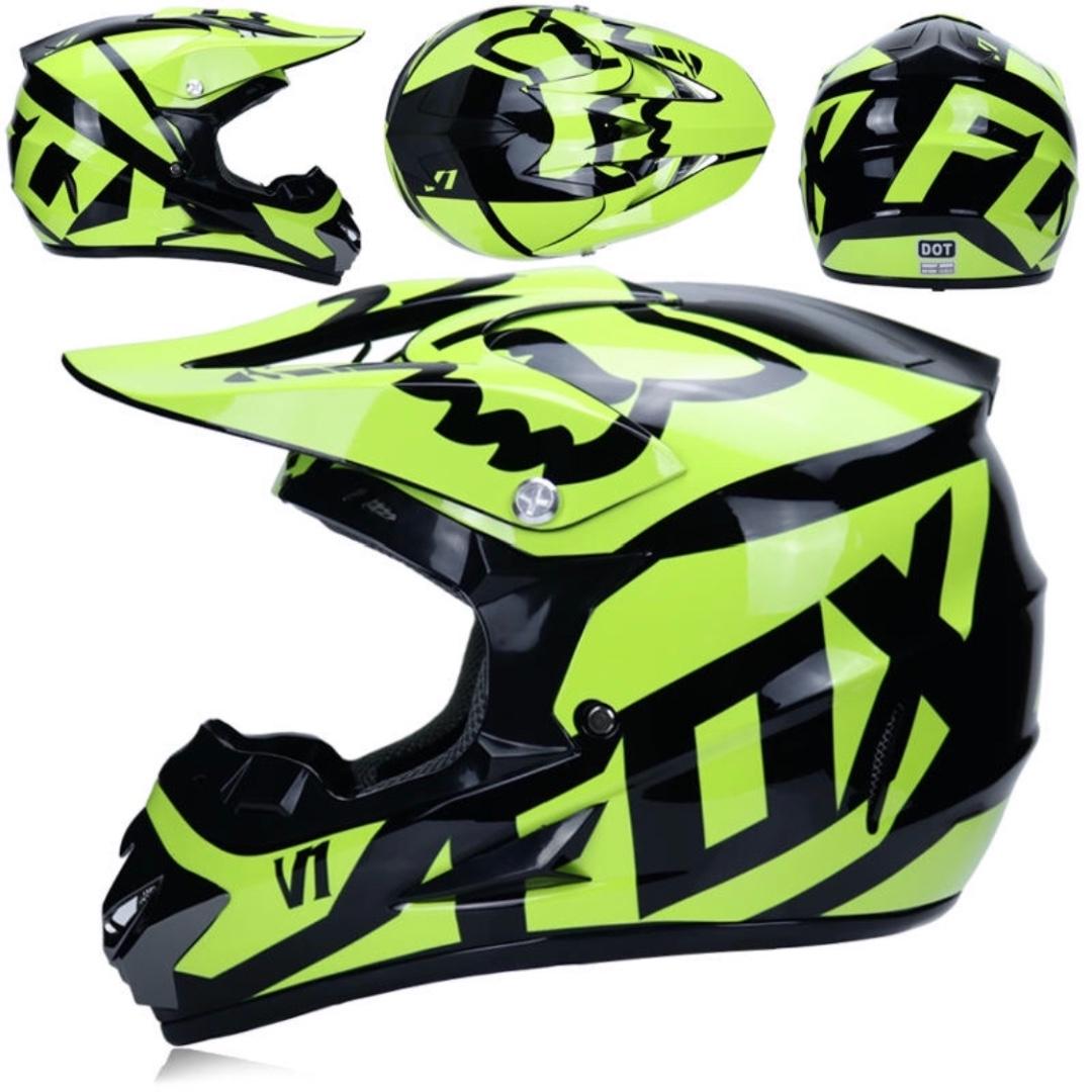 green and black dirt bike helmet