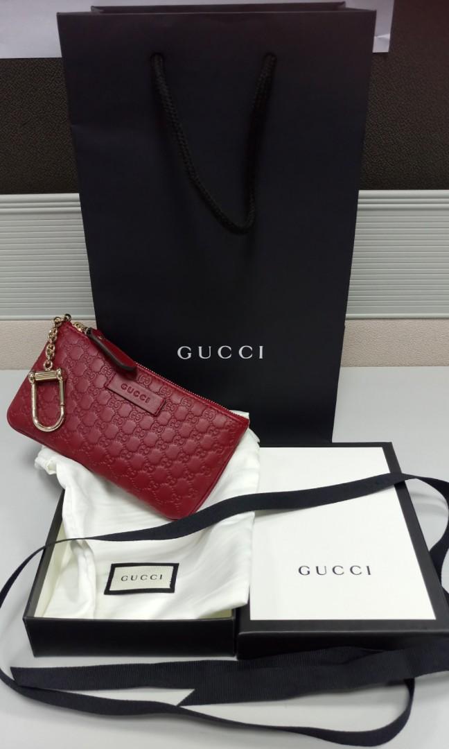 red gucci key pouch