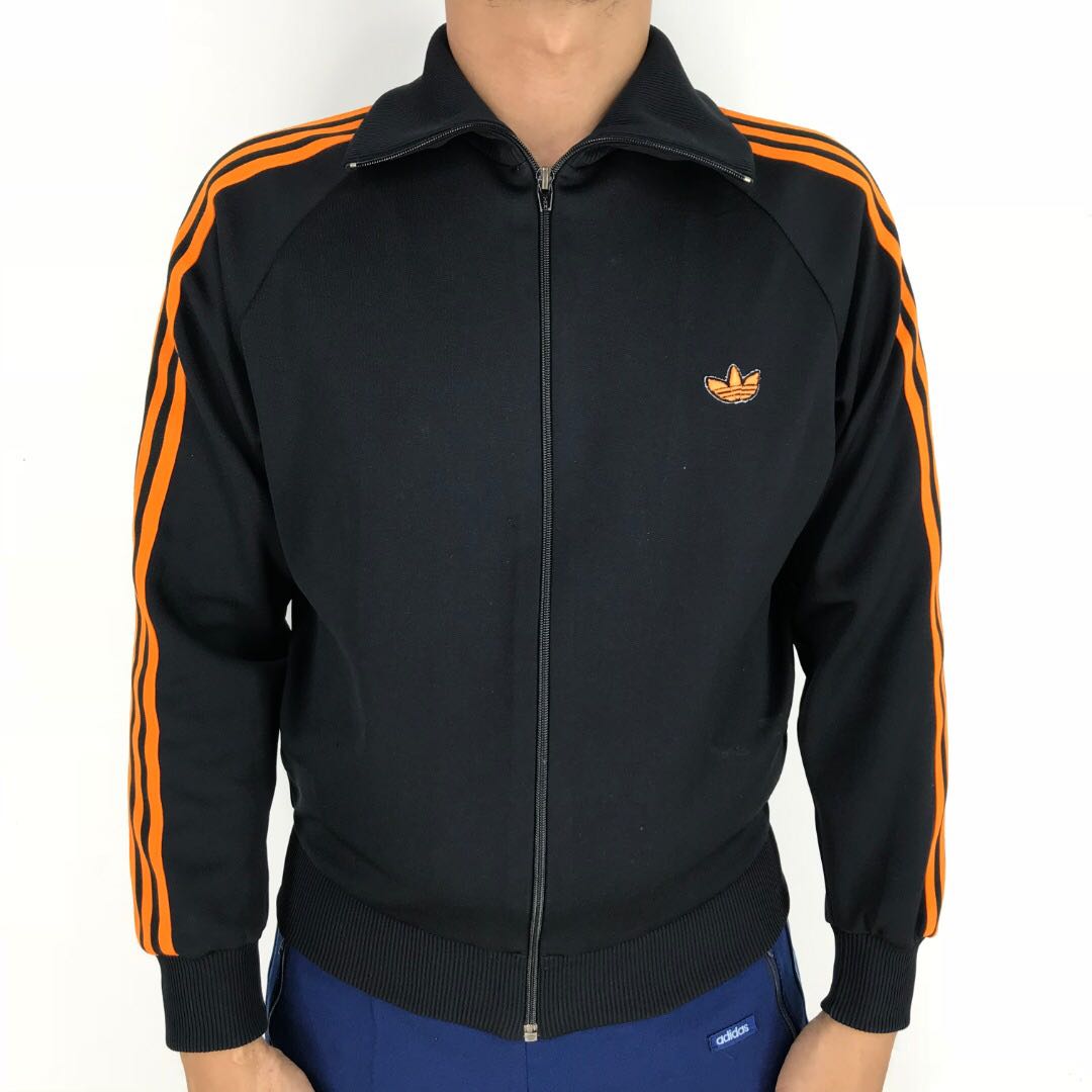black adidas jacket with orange stripes