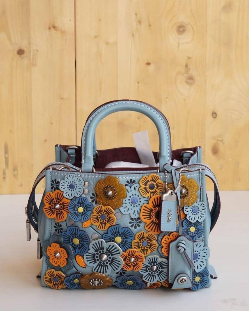 coach rogue 25 with tea rose steel blue size 25 23x21