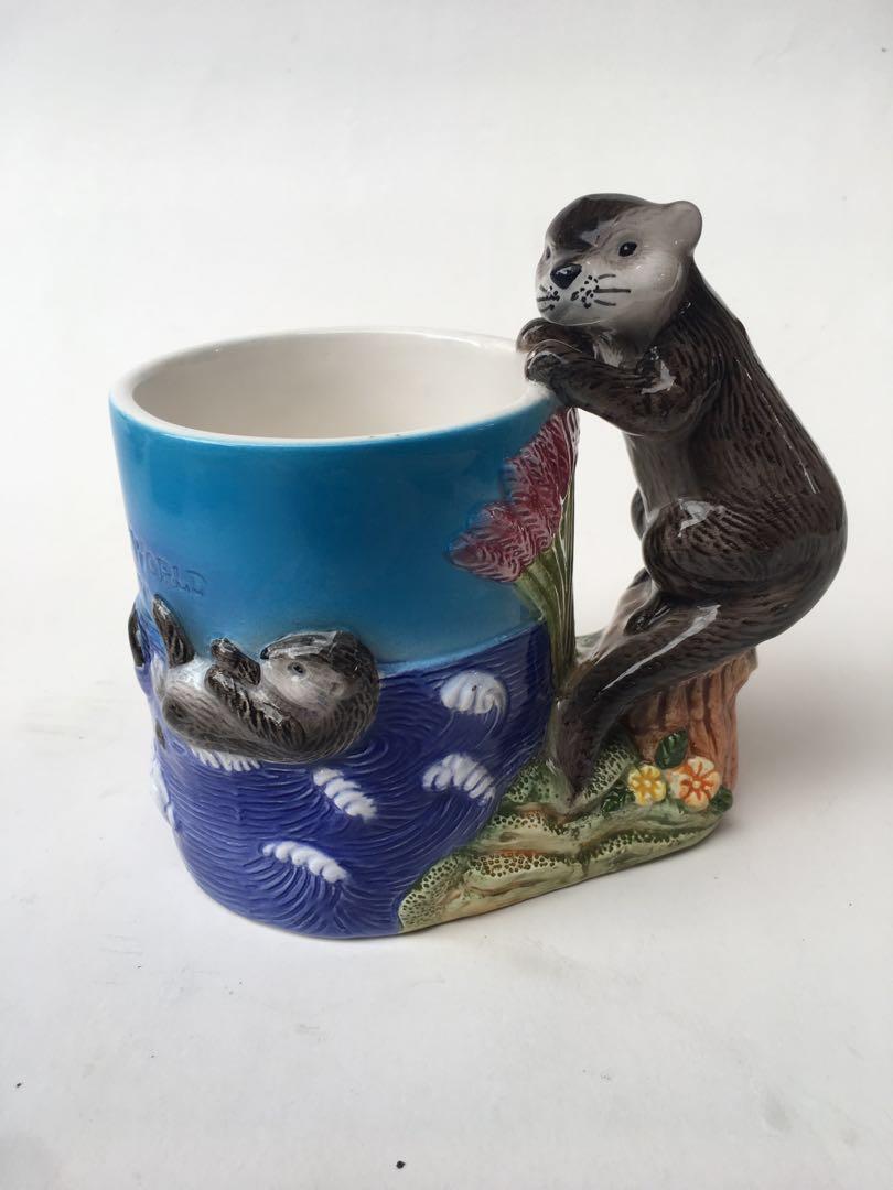 https://media.karousell.com/media/photos/products/2019/04/10/mug_keramik_3d_otter_singapore_underwater_sea_world_1554894701_22e15422_progressive.jpg