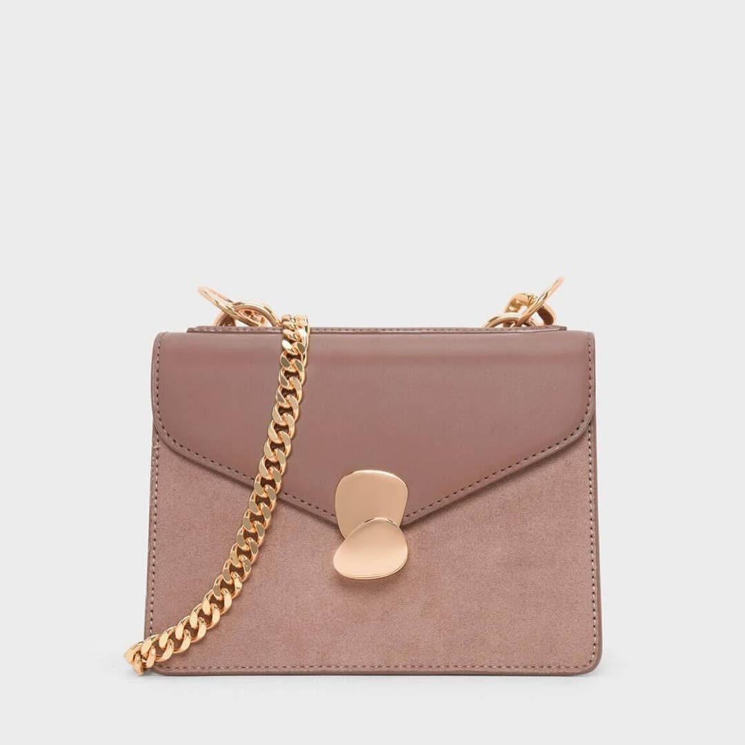 metal push lock crossbody bag
