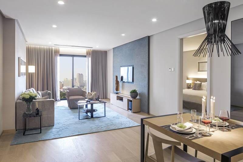 customised tv console with feature wall, wardrobe, kitchen