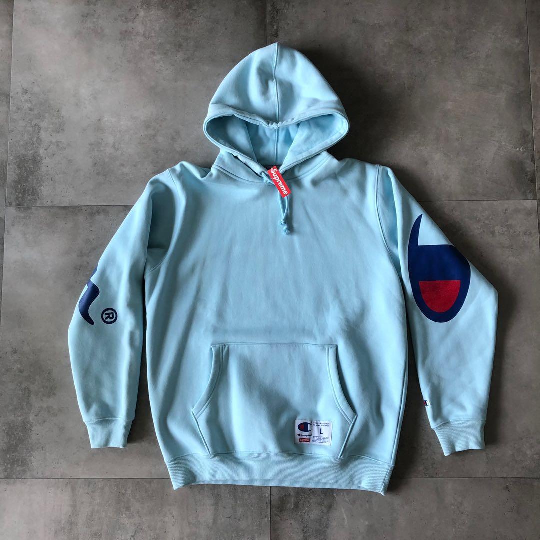 Supreme champion hoodie best sale light blue
